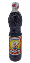 Load image into Gallery viewer, Bottle of fish sauce with a colorful label on a gray background

