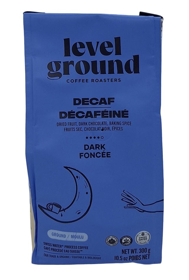 Blue package of Level Ground Coffee Roasters Decaf coffee on a gray background