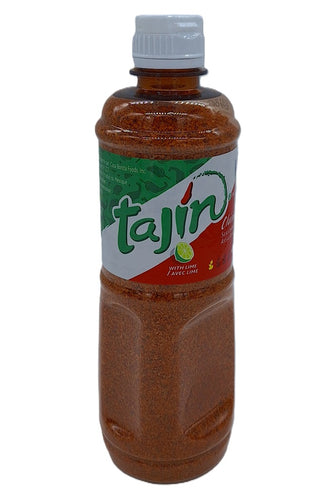 Bottle of Tajin seasoning on a white background